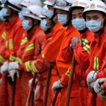 Nueve de los obreros atrapados bajo tierra en China continuan con vida